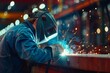 welder inspecting a finished weld