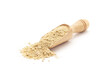 Front view of a wooden scoop filled with Organic Gram Flour (Cicer arietinum) or Besan. Isolated on a white background.