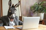 Fototapeta Lawenda - Shocked donkey with his mouth open in a store.A donkey sits at a desk with a laptop computer and a houseplant in a flowerpot. Generative AI