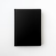 © Miva - Closed black hardcover notebook isolated on a white background