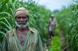 An Indian farmer with a turban standing in a lush green sugarcane field, with an expression of resilience