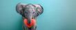 cute elephant holding a stuffed heart shape on pastel green background with lot of copy space