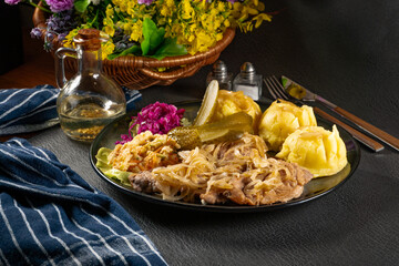 Canvas Print - Pork tenderloin stewed in onions.