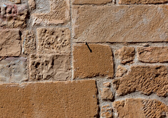 Canvas Print - Piedras irregulares en el muro