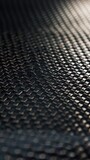 Fototapeta Konie - Carbon fiber weave close-up with a high gloss finish
