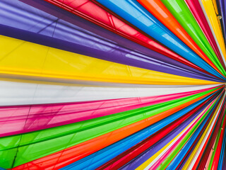 Rainbow cloth roof. Abstract image of tent roof fabricated from multicolored fabric. Colorful fabric in the festival. Multicolored backgrounds from fabrics of different colors, textured with patterns.