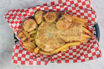 baked haddock served with scallops and fries