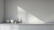 Sleek minimalist kitchen with stark white surfaces against a soft grey background, close-up view in high resolution captures the pristine cleanliness and subtle contrast