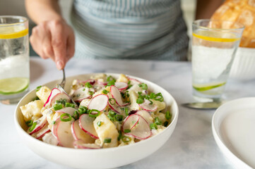 Wall Mural - Fresh prepared healthy potato salad served on a table