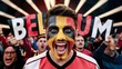 © Inventing Pixel. Inc - Excited Belgium Football fan with face painted enjoying in the stadium, behind Belgium text written.