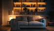 Interior of stylish living room with sofa and shelving unit at night