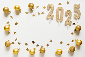 Poster - Golden Christmas balls and candles numbers 2025 on a light white background. Festive xmas decoration gold stars confetti. Empty space for copy space in the center