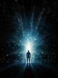 Silhouette of a man surrounded by sparkling blue energy, on dark background with copy space. Mystical experience, energy work, biofield, aura, meditation, afterlife concepts.