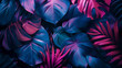 Layout creativo di colore fluorescente fatto di foglie tropicali. foglie  con contrasto e colori al neon. Concetto di natura, carta da parati moderna, pattern di foglie tropicali, giungla