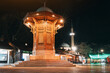 Sarajevo's iconic Sebilj fountain: A symbol of the city's rich heritage, illuminated against the night sky in Bascarsija distict