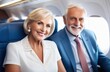 © Olga - elderly happy family in airplane cabin, travel
