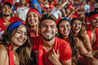 © PixelGallery - Chilean football soccer fans in a stadium supporting the national team, La Roja