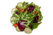 Delicious fresh salad with arugula, spinach, cucumber and cherry tomatoes in a ceramic plate
