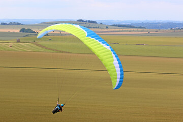 Poster - Paraglider flying from a hill	