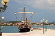 Beautiful wooden brown yacht near pier in blue sea, Sibenik, Croatia. Croatian travel, sea holidays