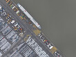 Aerial top down view on roll on roll off terminal, shipping and logistics of vehicles over the world. Top down view on ship docked and loaded in the port. Zeebrugge, Belgium.