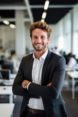 Wall Mural - A man in a suit and tie is smiling and posing for a photo