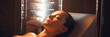 Woman receiving LED light therapy for skin cleansing