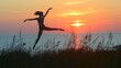 © Nadia - Woman balancing on one leg, arms raised against sunset backdrop