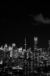 night Toronto city downtown skyline, twilight over CN Tower and skyscrapers of financial district Canada, black and white
