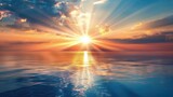 Fototapeta Zachód słońca - Setting sun casting rays over the ocean surface