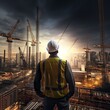© Shining Pro - Civil engineer in a hard hat and reflective vest overseeing construction at a skyscraper site, with cranes and scaffolding in the background