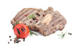 Piece of delicious grilled beef meat, rosemary, tomato and peppercorns isolated on white