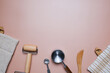 Cooking and baking background. The composition for the kitchen utensil flat lay on pink neutral background.
