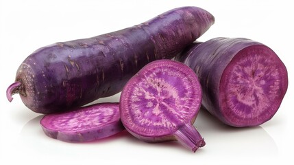 Wall Mural - Purple vegetables halved on white background