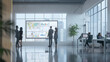 © SKW - A group of people are standing in a large room with a large screen on the wall. They are looking at the screen and discussing something. The room is well-lit and has a modern, professional feel