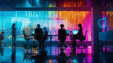 Fototapeta Łazienka - A group of people are sitting at a table in a brightly lit room. The room is decorated with colorful lights and the people are working on their laptops. Scene is focused and productive