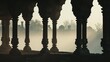 Hazy silhouette of ancient pillars and arches emerging from a soft mist evoking a sense of mystery and timelessness in this defocused image of historic architecture. .