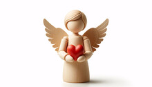 A Wooden Angel Figurine Holding A Red Heart