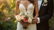 A bride and groom holding a bouquet of flowers together on their wedding day, symbolizing love and partnership. 