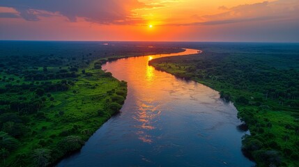 Wall Mural - A river with a sunset in the background