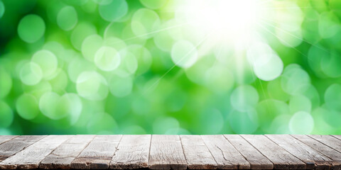 Wall Mural - Empty wooden table over blurred sunny bokeh natural background