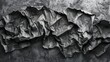 Charcoal creases on a gray backdrop