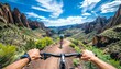 Cyclist conquering mountainous road with unique landscape view, showcasing deep ravines