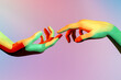 Multicolored background isolated hand