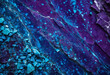 Abstract background with multicolored pieces of marble in blue and purple tones