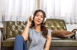 Portrait of smiling beauty asian woman happy and relax listening to music with headphones and singing, happy calm, resting ,good healthy, podcast, sound audio, listen online song at home