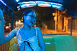 Asian woman traveler transpotation via tuk tuk local taxi enjoy night life travel in Bangkok city, Thailand