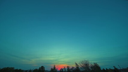 Wall Mural - timelapse of the sky at sunrise