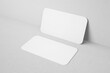 © Regi Munandar - blank minimal clean 90x50mm us size horizontal brand identity business name card with round corner leaning to wall realistic mockup design template 3d render illustration