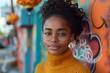 Portrait of beautiful young african american woman in yellow sweater and eyeglasses